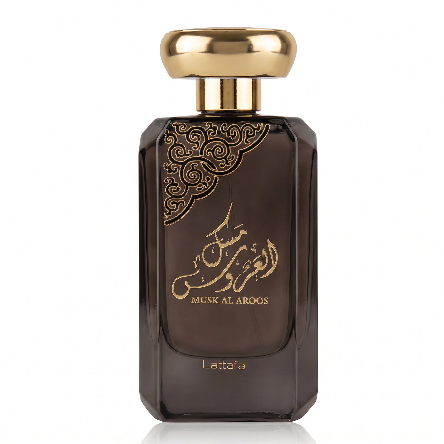 A dark brown glass perfume bottle with a shiny gold cap and gold Arabic calligraphy on the front, labeled 'Musk Al Aroos' and 'Lattafa', on a white background.