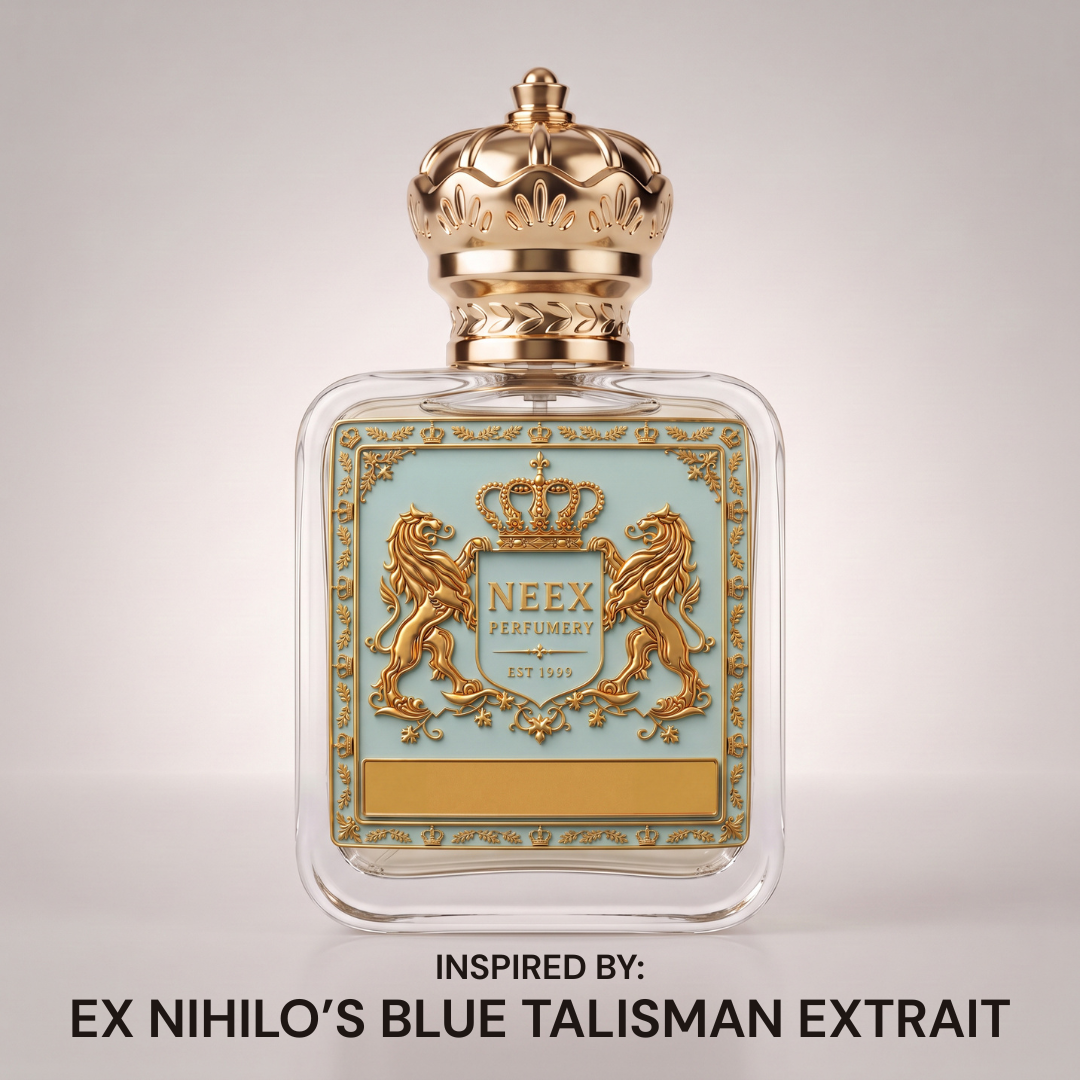 Neex Perfumery perfume bottle featuring an ornate gold crown cap and light duck-egg blue crest label, centered against a clean off-white studio background with text below reading "INSPIRED BY: EX NIHILO'S BLUE TALISMAN EXTRAIT".   
